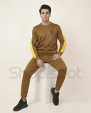 Brown tracksuit with yellow stripes