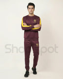 Maroon tracksuit with yellow and white accents
