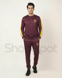 Maroon tracksuit with yellow and white accents