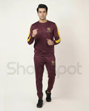 Maroon tracksuit with yellow and white accents