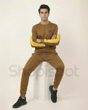 Brown tracksuit with yellow stripes
