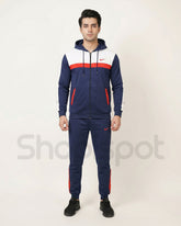 Navy tracksuit with red and white accents