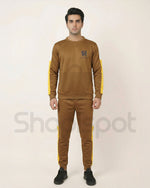 Brown tracksuit with yellow stripes