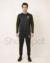 Black and yellow tracksuit with brand logo