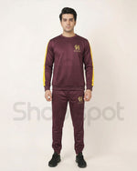Maroon tracksuit with yellow and white accents