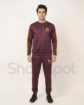 Maroon tracksuit with yellow and white accents