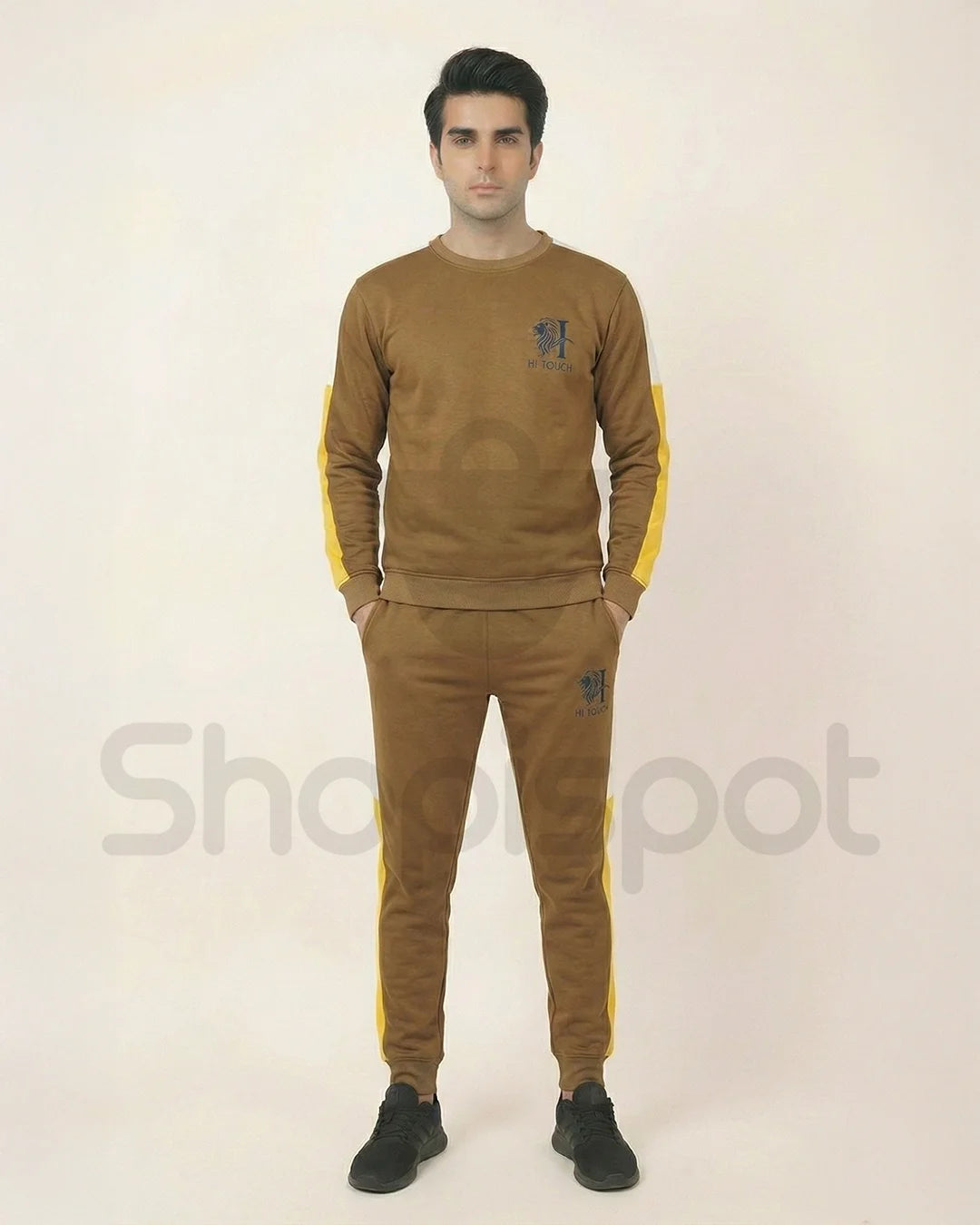 Brown tracksuit with yellow stripes