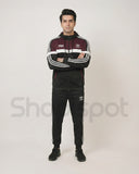 Black and maroon tracksuit with Adidas logo