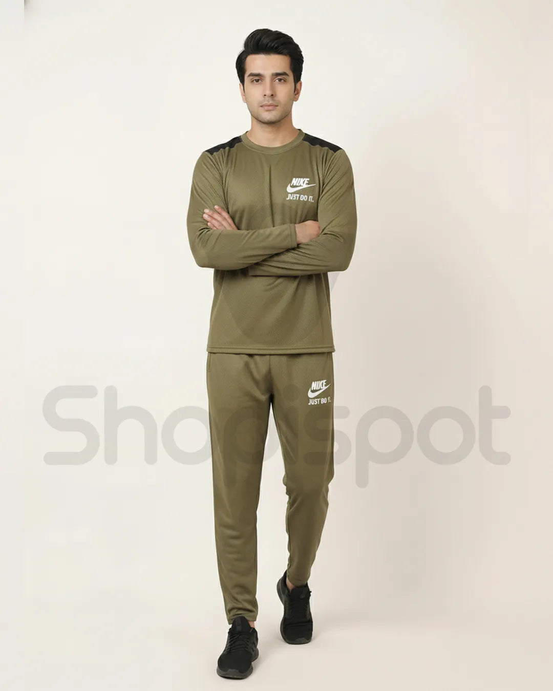 Green tracksuit with Nike logo