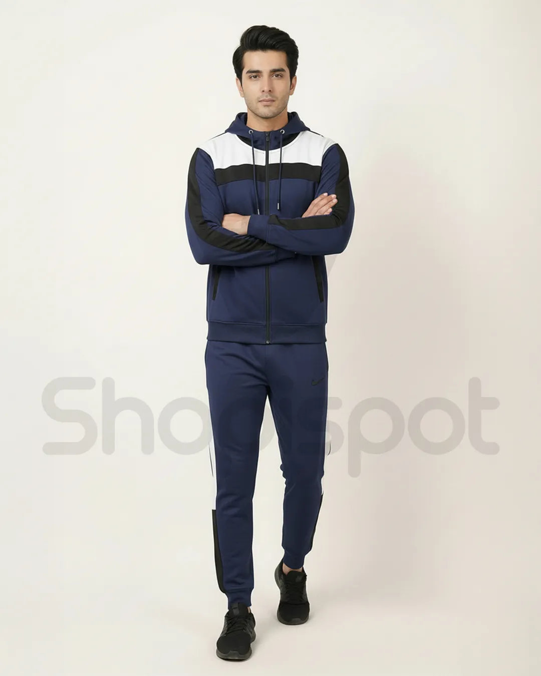 Navy and white tracksuit with a Nike tag