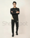 Black Nike tracksuit with white accents
