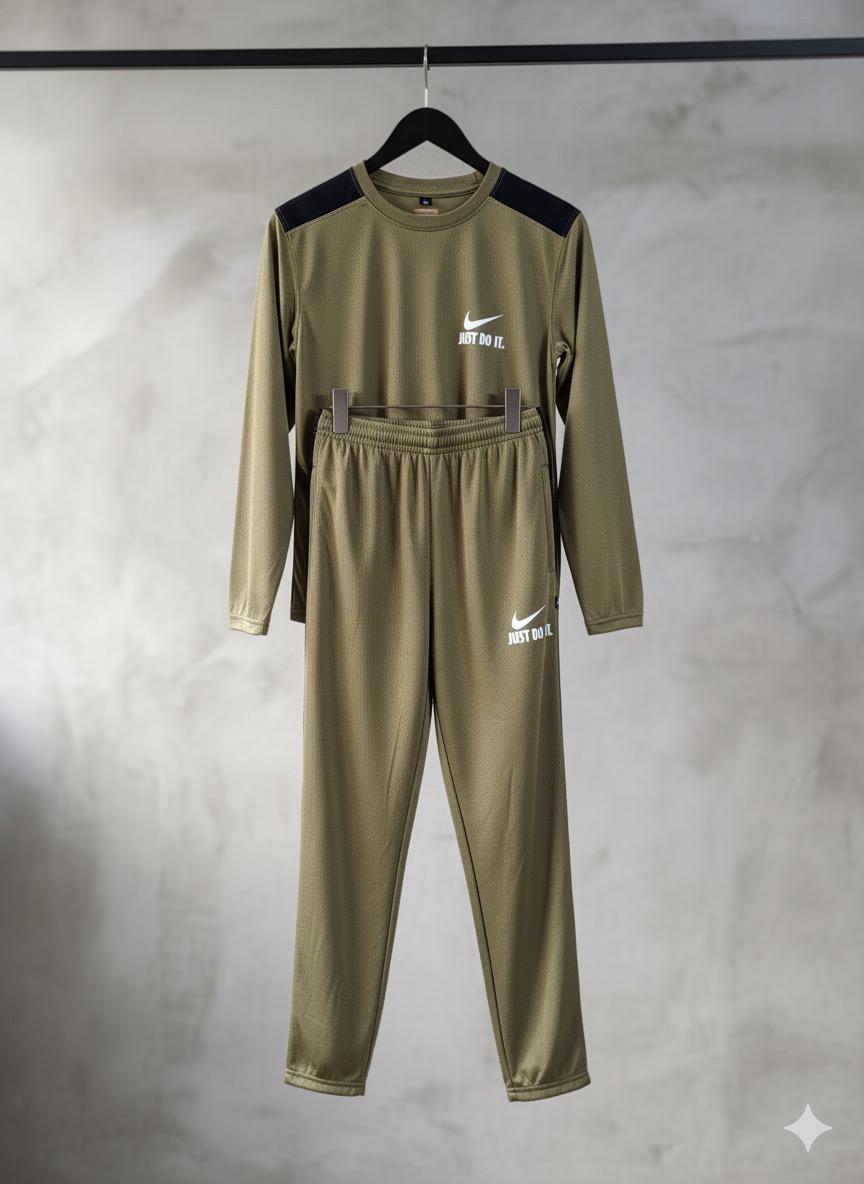 Green tracksuit with Nike logo on a gray background