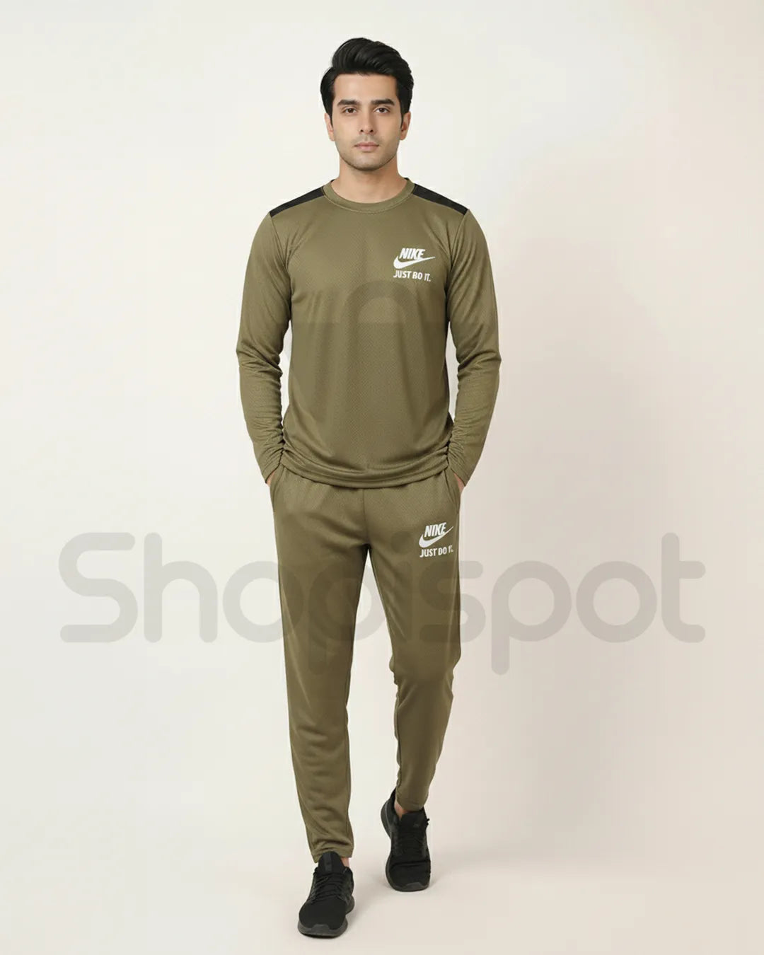 Green tracksuit with Nike logo