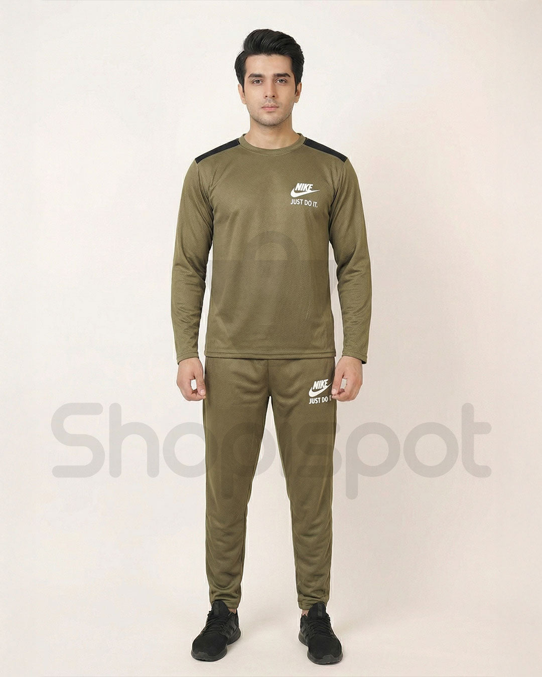 Green tracksuit with Nike logo