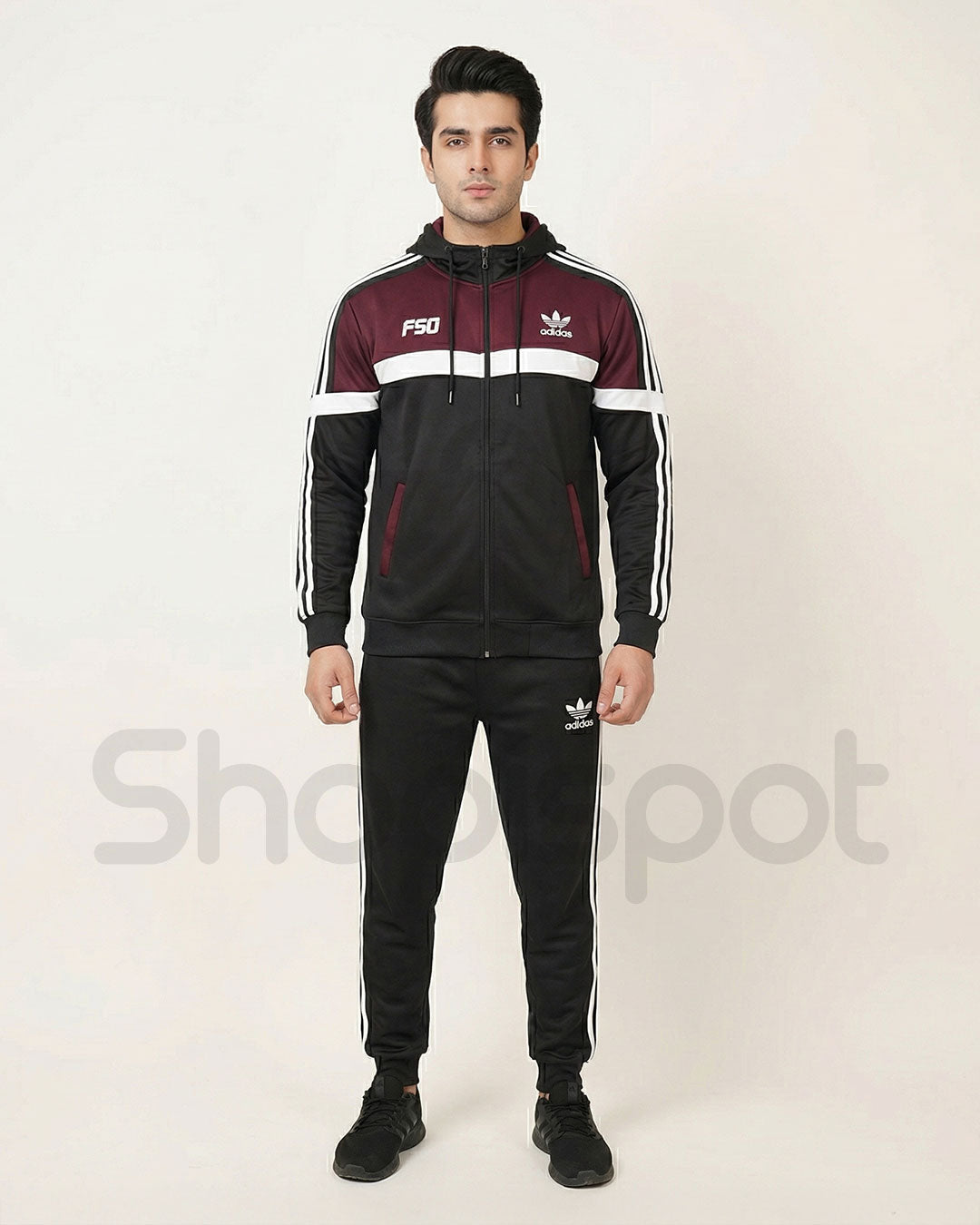 Black and maroon tracksuit with Adidas logo