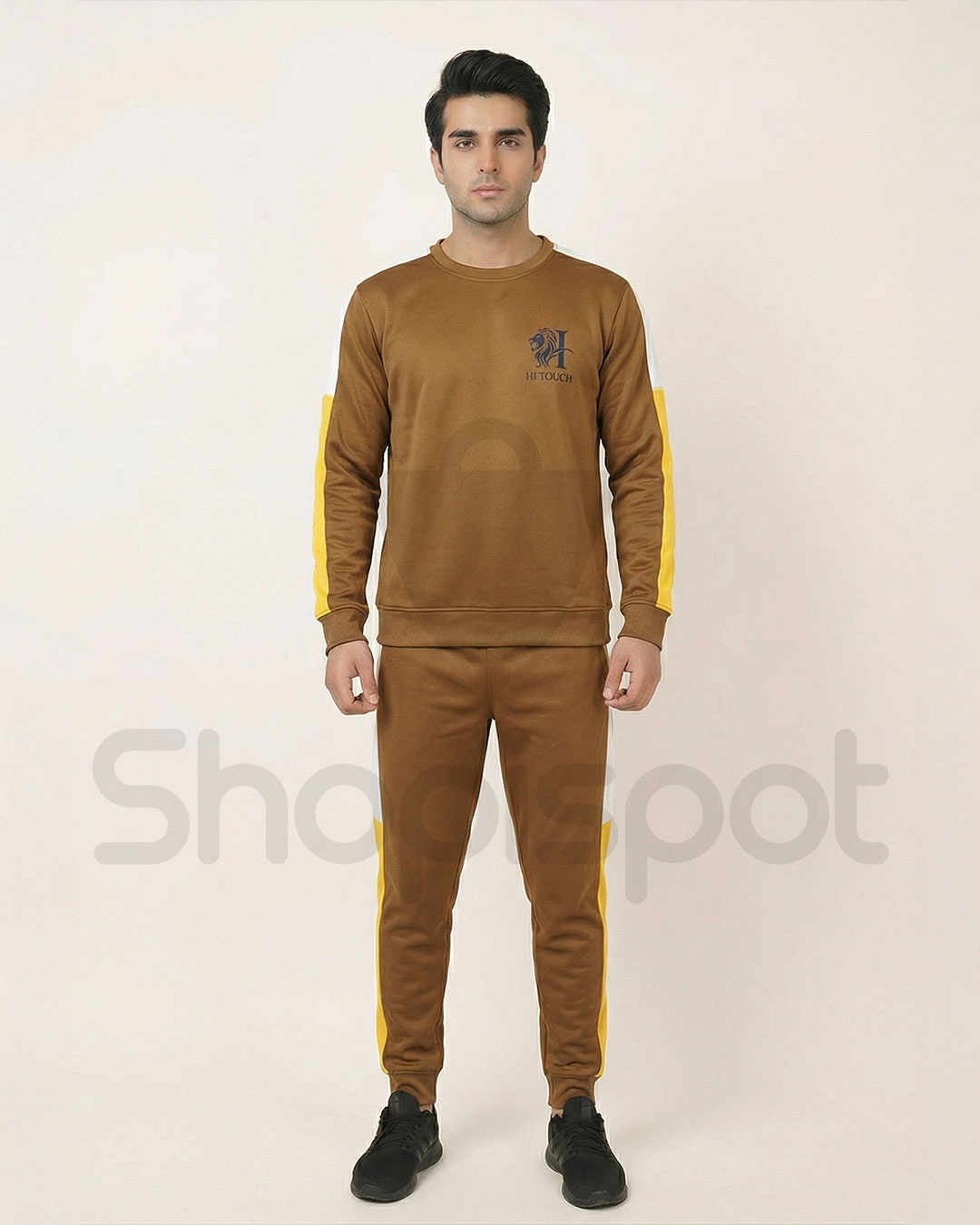 Brown tracksuit with yellow stripes